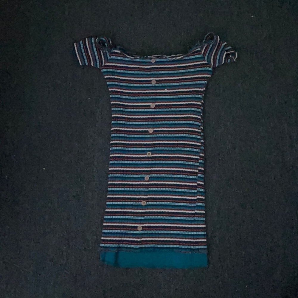 a long strapless dress with buttons